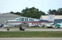 N7243C @ KOSH - Beech F33A - by Mark Pasqualino
