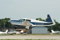 D-EHWI @ KOSH - Mooney M20K - by Mark Pasqualino