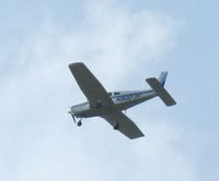 N9027F @ KAXN - Piper PA-28-151 flying the patterm - by Kreg Anderson