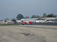 N554DK @ SZP - 2008 American Champion 8GCBC SCOUT, Lycoming O-360-C1G 180 Hp, tundra tires, turning off Rwy 22 - by Doug Robertson