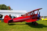 N7711J @ IA27 - At the Antique Airplane Association Fly In.   PT-27 42-15833 - by Glenn E. Chatfield