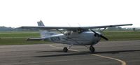 N2412W @ KAXN - 2007 Cessna 172S Skyhawk on the ramp.