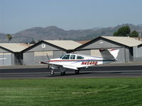 N454RB @ SZP - 1966 Beech V35 TURBO BONANZA, Continental TSIO-470-B engine change from original Continental IO-520-B 285 Hp, landing roll Rwy 22 - by Doug Robertson