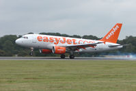 G-EZFD @ EGGW - Easyjet A319 landing at Luton - by Terry Fletcher
