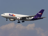N422FE @ KLAX - Classic fly by cable Airbus on short final for rwy 24R. - by Philippe Bleus