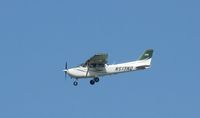 N513ND @ KAXN - Landing on runway 22. Cessna 172S Skyhawk from UND - by Kreg Anderson