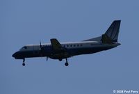 N220MJ @ IAD - United opereated Saab on short final