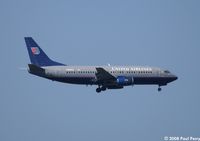 N328UA @ IAD - Darker livery on her
