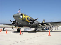N45366 @ CMA - 1943 Douglas C-53D SKYTROOPER 'D-DAY DOLL', two Curtiss-Wright R-1820-56 1,200 Hp each, nose art - by Doug Robertson