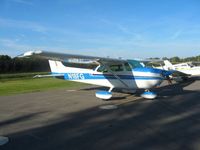 N18FG @ I12 - On the ramp at Sidney, Ohio during the EAA fly-in.