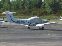 N6403A @ ISZ - On the ramp at Cincinnati Blue Ash - by Bob Simmermon