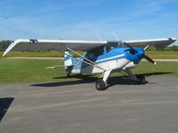 N7250D @ I12 - On the ramp at Sidney, Ohio during the EAA fly-in - by Bob Simmermon