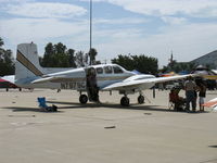 N787SC @ CMA - 1962 Beech D50E TWIN BONANZA, two Lycoming GO-480-G2F6 295 Hp each, three abreast seating-pilot & two copilots, airstair door - by Doug Robertson