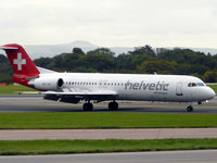 HB-JVE @ EGCC - Taxying off the runway - by John1958