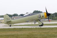 C-FGAT @ KOSH - Taxi to parking - by Todd Royer