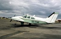 SE-FNR @ EGLK - Beech Baron D55 seen at Blackbushe in September 1976. - by Peter Nicholson