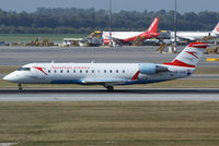 OE-LCQ @ VIE - Austrian arrows Canadair Regional Jet CRJ200LR