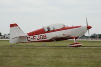 C-FJQB @ KOSH - Taxi for departure - by Todd Royer