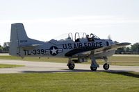 N28XT @ KOSH - Taxi for departure - by Todd Royer