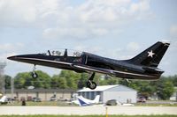 N39AX @ KOSH - Departing OSH on 27 - by Todd Royer