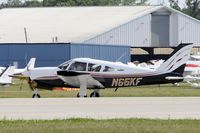 N65KF @ KOSH - Taxi to parking - by Todd Royer