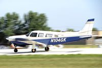N104GK @ KOSH - Departing OSH on 27 - by Todd Royer