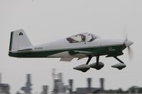 N133DW @ KOSH - Departing OSH on 18 - by Todd Royer