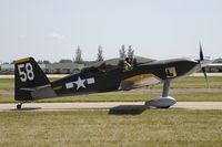 N158CF @ KOSH - Taxi for departure