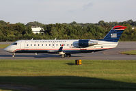 N458AW @ ORF - US Airways Express (Air Wisconsin) N458AW (FLT AWI3673) taxiing to RWY 23 for departure to Charlotte/Douglas Int'l (KCLT).