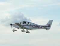 N878CD @ KOSH - SR22 - by Mark Pasqualino