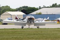 N243MD @ KOSH - Taxi to parking - by Todd Royer