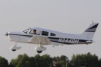 N244BM @ KOSH - Departing OSH on 27 - by Todd Royer