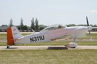 N311U @ KOSH - Taxi for departure - by Todd Royer