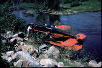 N9038 - My dad, Harold Gene Crosby was the pilot this day, flying for Johnson Aviation out of McCall. The engine failed after some repair work. He got it down OK on the road next to the Payette river near McCall, Idaho. The road was freshly graded, and had some b - by Harold Gene Crosby