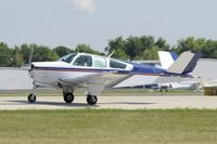 N358T @ KOSH - Landing 27 at OSH - by Todd Royer