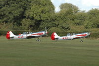 G-YAKZ @ EGTH - G-YAKZ with G-YAKU at Shuttleworth Autumn Air Display Oct. 09 - by Eric.Fishwick