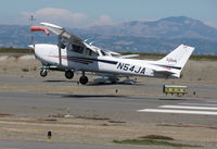 N54JA @ SQL - 1998 Cessna 172R near touchdown in stiff crosswind - by Steve Nation