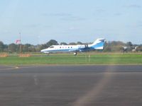 N38SK @ OSU - Landing on 27L at Columbus, Ohio - by Bob Simmermon