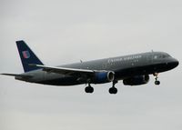 N413UA @ DFW - Landing on 18R at DFW on a rainy, overcast day! - by paulp