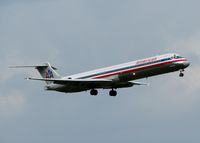 N595AA @ DFW - Landing on 18R at DFW. A rainy day in Dallas on this day! - by paulp