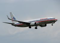 N906AN @ DFW - American 737 landing on 18R at DFW. Rainy day! - by paulp