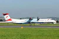 OE-LGA @ LOWL - Austrian Arrows DHC-8-402 landing on RWY09 - by Janos Palvoelgyi