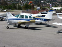 N777AK @ KSQL - illinois-based 1976 Beech A36 on visitor's ramp - by Steve Nation