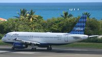 N648JB @ TNCM - taking off for KJFK