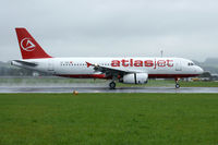 TC-OGI @ LOWL - Atlasjet Airlines Airbus A-320-232 landing on RWY09 in LOWL/LNZ - by Janos Palvoelgyi