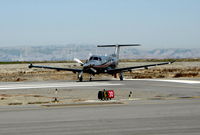 N56RJ @ KSQL - 2006 Pilatus Aircraft Ltd PC-12/47 turning onto RWY 30 - by Steve Nation