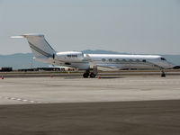 N63HS @ KOAK - 2004 Gulfstream Aerospace GV-SP (G550) on North Field visitor's ramp - by Steve Nation