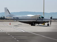 N1116N @ KOAK - Martinaire 1994 Cessna 208B freighter on North field ramp - by Steve Nation