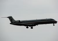 N521AE @ DFW - Landing on 18R at DFW on a gloomy, nasty day! - by paulp
