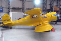 G-BRVE @ EGSU - Becch Staggerwing preserved at Imperial War Museum Duxford - by Terry Fletcher